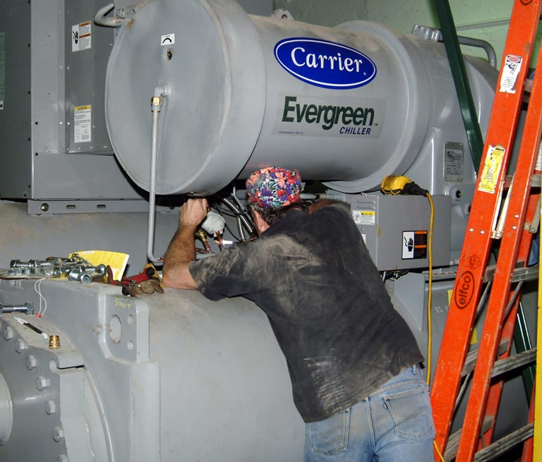 Team Member Installs Chiller